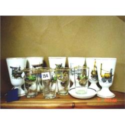 Commemorative railway pottery and glass, set of six glazed chocolate cups plus five Pirelli glasses 