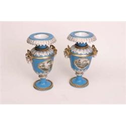 Pair late 19th century porcelain vases decorated in blue, white and gilt, two goats head handles, bo