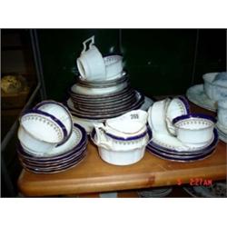 Late Victorian tea set made by Cauldron England, banded in cobalt blue and gilded, comprising of nin