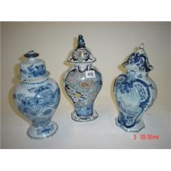 Three 19th century Delft vases, two with lids, all need some restoration