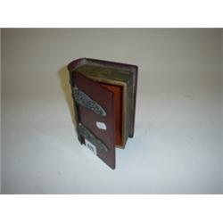 Amber bakalite trinket box in the form of a book, cast spine and hinges 6x4"