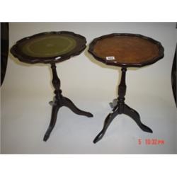 Two contemporary style wine tables with leather inserts