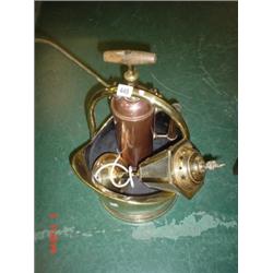 Brass helmet coal scuttle, lamp and sprayer