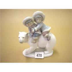 Lladro figure of two Eskimo children riding a polar bear No 5353, 7" high