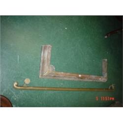 Brass round handrail with scroll ends and a copper fire surround.