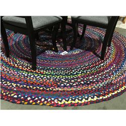 ROUND MULTI COLORED AREA RUG APROX 8' DIAMETER