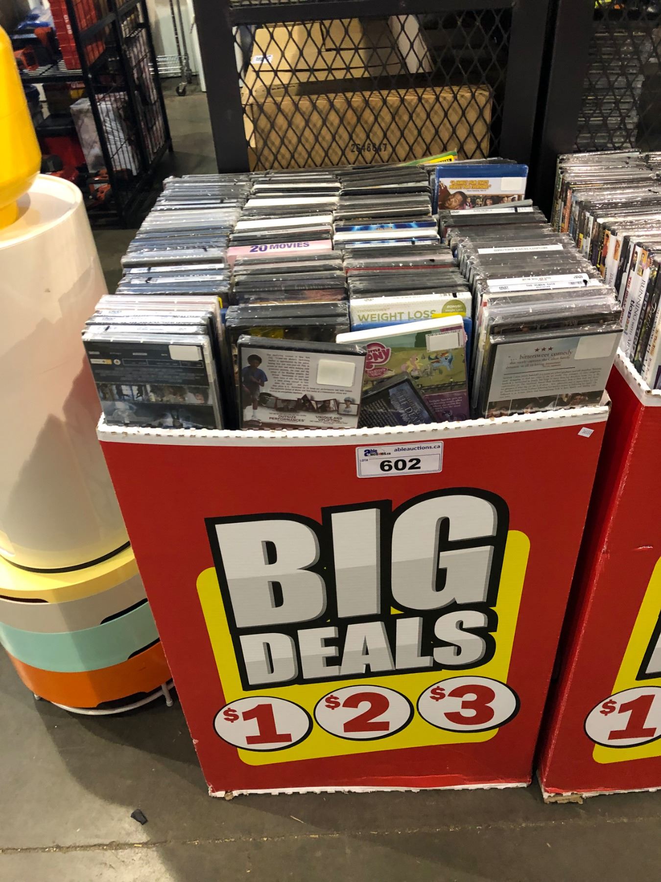 LARGE STORE DISPLAY OF DVDS AND BLU RAYS