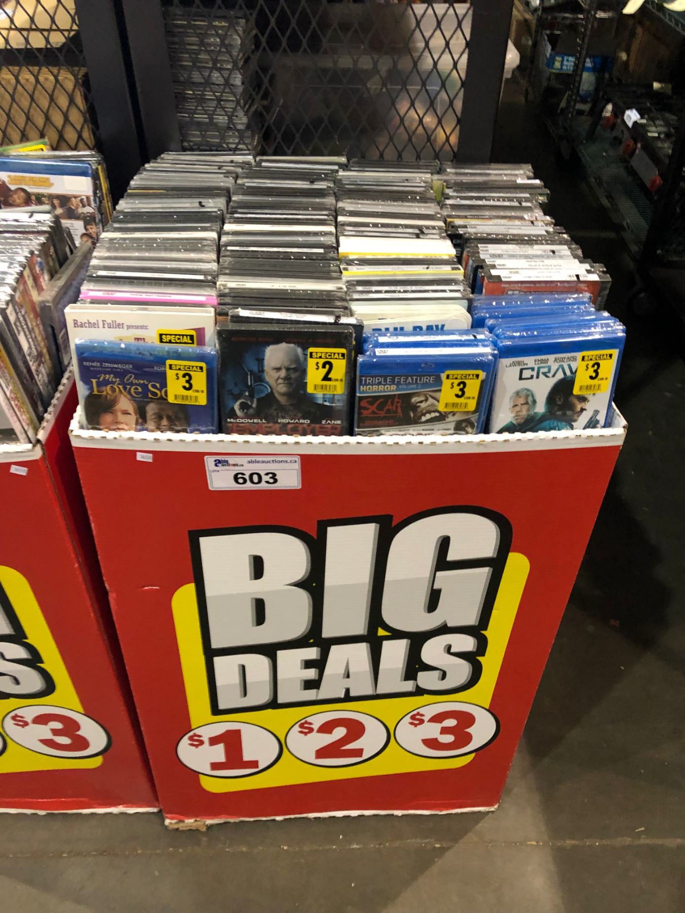 LARGE STORE DISPLAY OF DVDS AND BLU RAYS