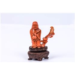 Budha and wood - old red coral figure
