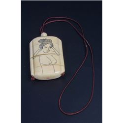 Erotic Japanese inro from engraved cone