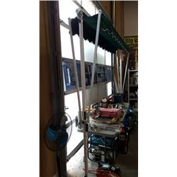 10 FOOT RETRACTABLE AWNING, GREEN WITH WHITE FRAME