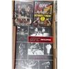 Image 2 : TRAY OF UFC DVDS AND BOOK AND LARGE HUMAN ANATOMY BOOK