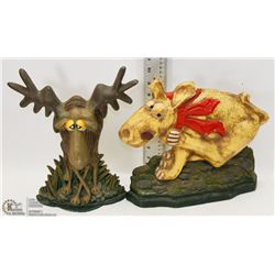 TWO VINTAGE CAST IRON DOOR STOPS.