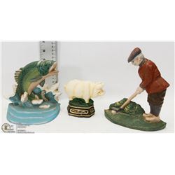 THREE VINTAGE CAST IRON DOOR STOPS.