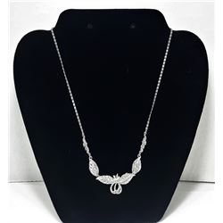 17)  SILVER TONE & CLEAR CRYSTAL LEAF