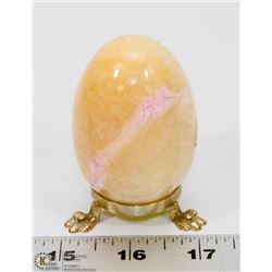 EGG SHAPED STONE ON STAND