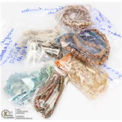BAG OF WOOD, GLASS, AND NATURAL STONE NECKLACES