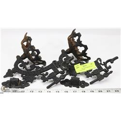 PAIR OF CAST IRON SWIVELLING WALL HANGERS