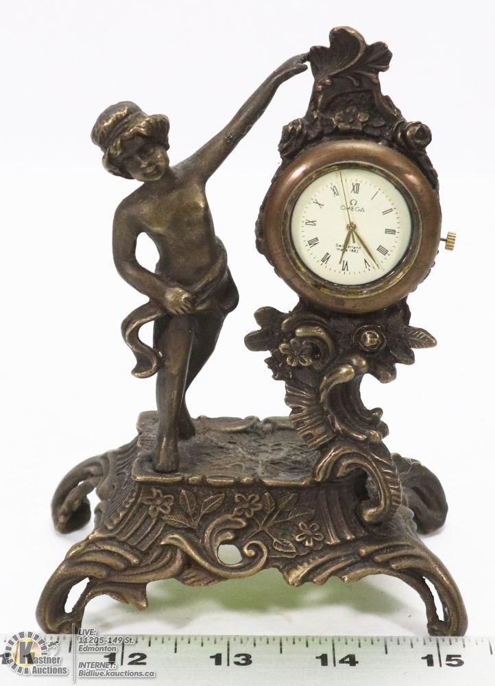 SWITZERLAND MADE 1882 OMEGA CAST DESK CLOCK.