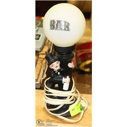VINTAGE CHARLIE CHAPMAN BAR LAMP.