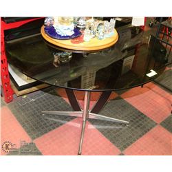 TABLE WITH SMOKED GLASS TOP 42" DIAMETER 29"H.