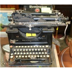 1920 REMINIGTON TYPEWRITER WITH CLOTH COVER