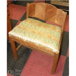 ANTIQUE WOOD CARVED CHAIR W/ SILK PRINTED CUSHION.