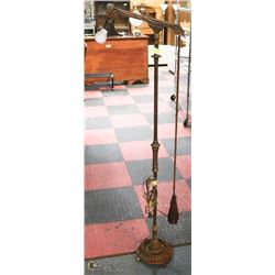 ANTIQUE BRASS WEIGHTED LAMP.