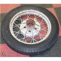 MODEL A FORD TIRE AND RIM.