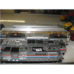 1 Chinese made AmTrak Engine, 1 Japanese Engine with 4 cars