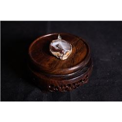 A crystal cave pendant.