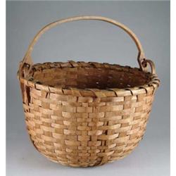 SWING HANDLED ROUND BASKET.