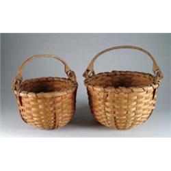 TWO SMALL SWING HANDLED SPLINT BASKETS.