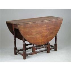 IMPORTANT AND RARE MAPLE SINGLE DRAWER WILLIAM AND MARY GATELEG DINING TABLE.