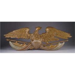 CARVED WOOD AND PAINTED EAGLE PLAQUE.