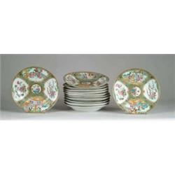 SET OF TWELVE ROSE MEDALLION SHALLOW BOWLS.