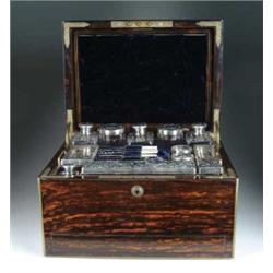 OUTSTANDING AND COMPLETE ROSEWOOD SILVER AND GLASS FITTED LADIES TRAVELING BOX.