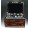 Image 1 : OUTSTANDING AND COMPLETE ROSEWOOD SILVER AND GLASS FITTED LADIES TRAVELING BOX.