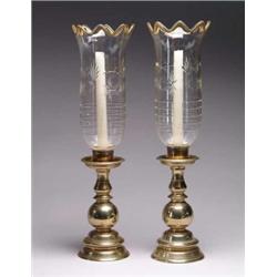 PAIR OF BRASS AND GLASS HURRICANE LAMPS.