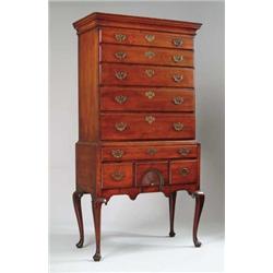 OUTSTANDING QUEEN ANNE TWO PART FAN CARVED HIGHBOY.