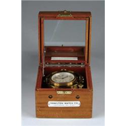 CASED MARINE CHRONOMETER BY HAMILTON WATCH CO.