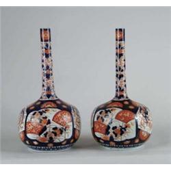 EXCEPTIONAL PAIR OF JAPANESE IMARI POLYCHROME GOURD SHAPE WATER BOTTLES.