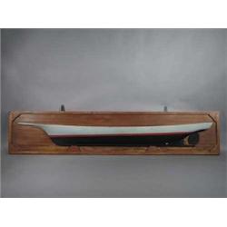 HUGE SHIP’S HALF MODEL MOUNTED ON A MAHOGANY BOARD. 