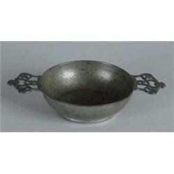 EARLY DOUBLE-HANDLED PEWTER PORRINGER.
