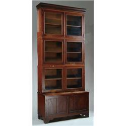 FOUR SECTION ANTIQUE EMPIRE BOOKCASE.