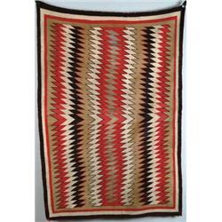 FINE ANTIQUE NAVAJO EYE DAZZLER RUG.