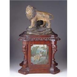 OUTSTANDING FIGURAL CARVED WOOD AND POLYCHROME TOBACCO BOX.