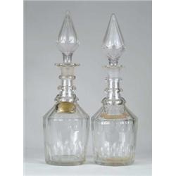 PAIR OF CUT GLASS THREE RING DECANTERS.