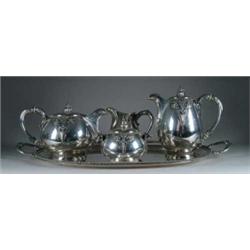 FINE SOLID SILVER FANCY FIVE PIECE TEA SET.