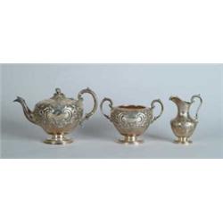 THREE PIECE ENGLISH STERLING TEA SET.